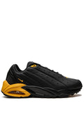 X Nocta Hot Step Air Terra Black University Gold Sneakers